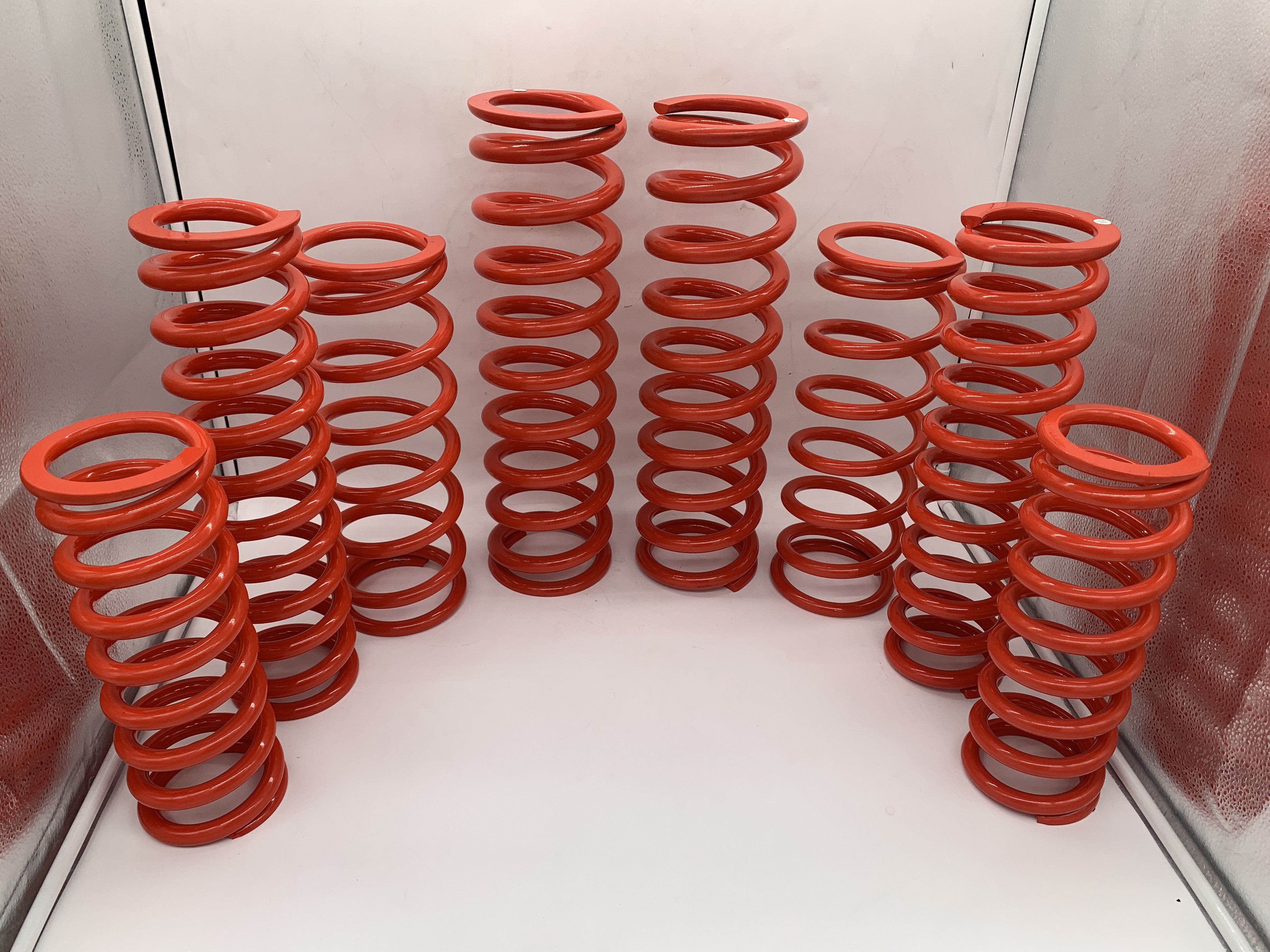 MTS Off-Road dual rate spring kit for the Can-Am Maverick R MAX, powder coated in Can-Am Red